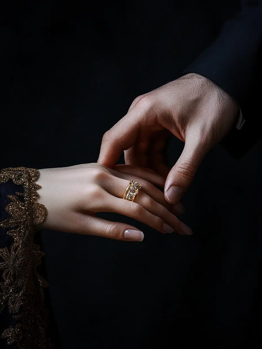 An image of a man putting a ring on a woman's finger, representing the energy of the Wedding Spell